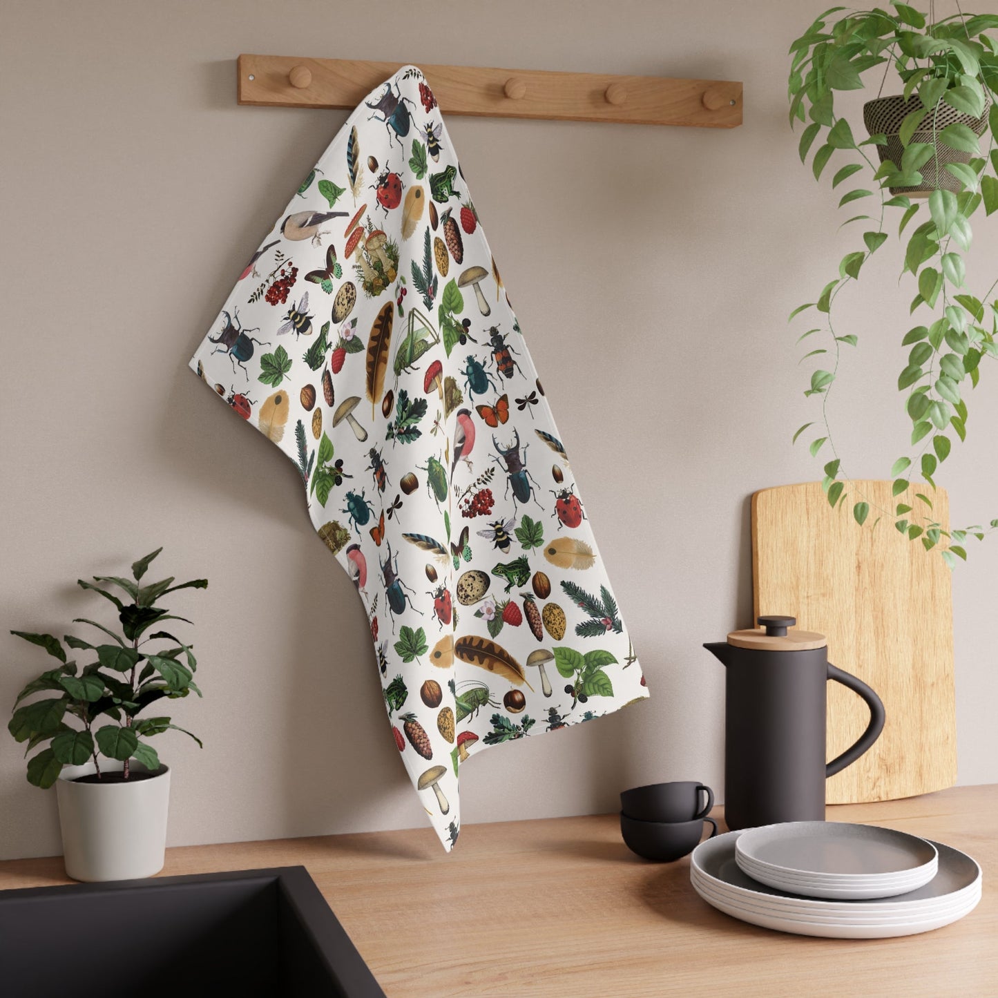 Bugs and leaves kitchen towel.
