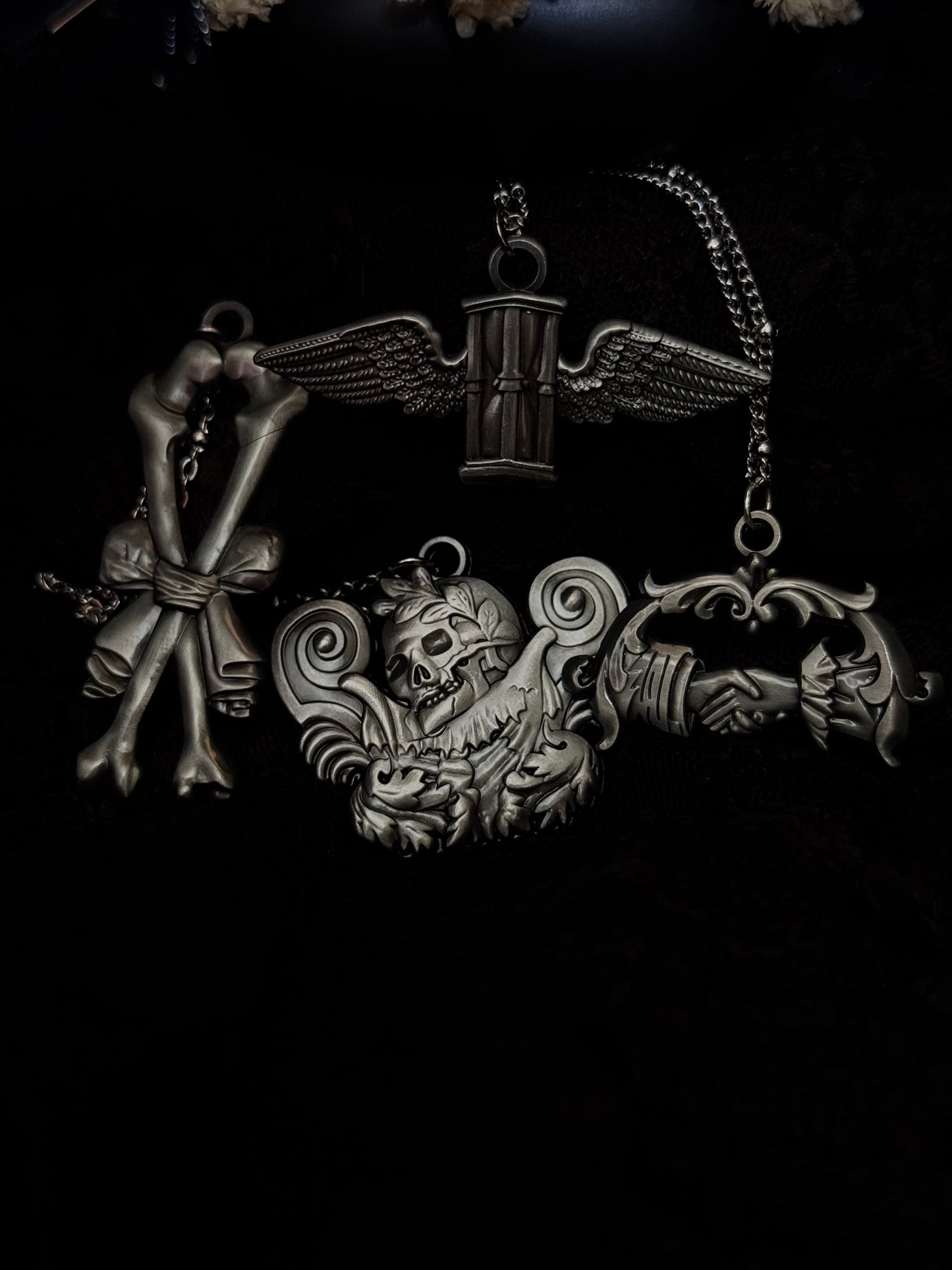 Carved In Stone- Skull and Plumes – Adornments