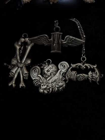 Carved In Stone- Skull and Plumes – Adornments