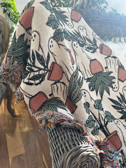 ghost woven blanket 50x60” clearance with potted plants