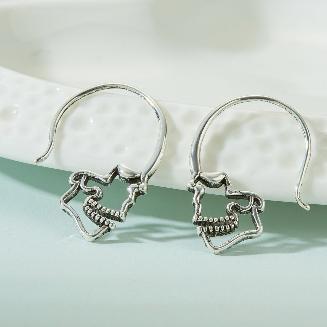 SILVER SKULL HOOP EARRINGS (PAIR) –