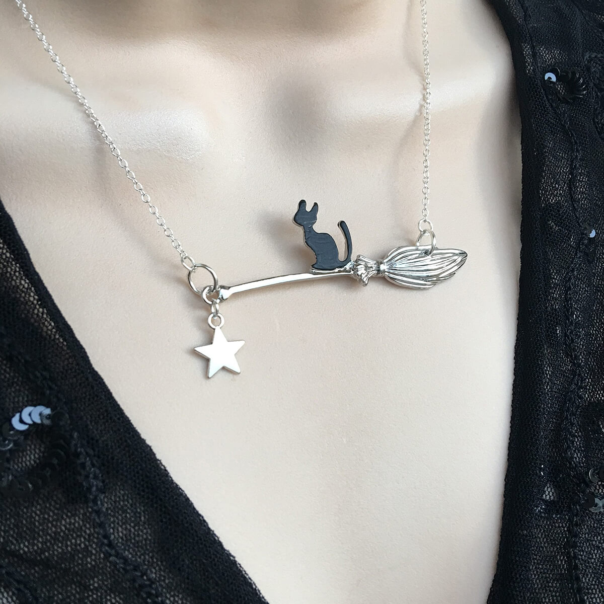 CAT BROOMSTICK NECKLACE –
