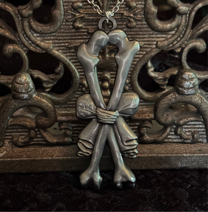 Carved In Stone- Bow and Bones – Adornments