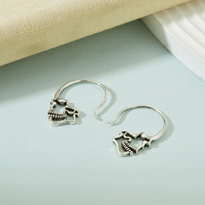 SILVER SKULL HOOP EARRINGS (PAIR) –