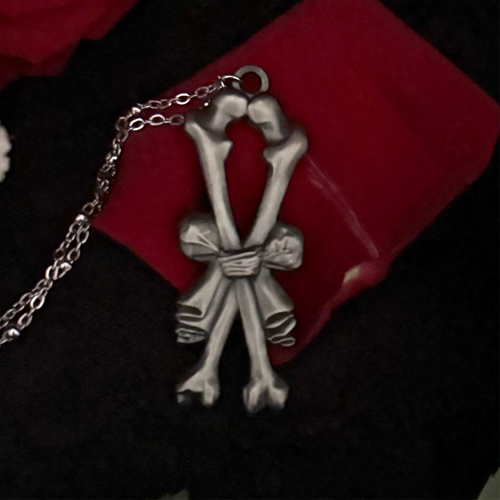 Carved In Stone- Bow and Bones – Adornments