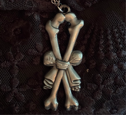 Carved In Stone- Bow and Bones – Adornments