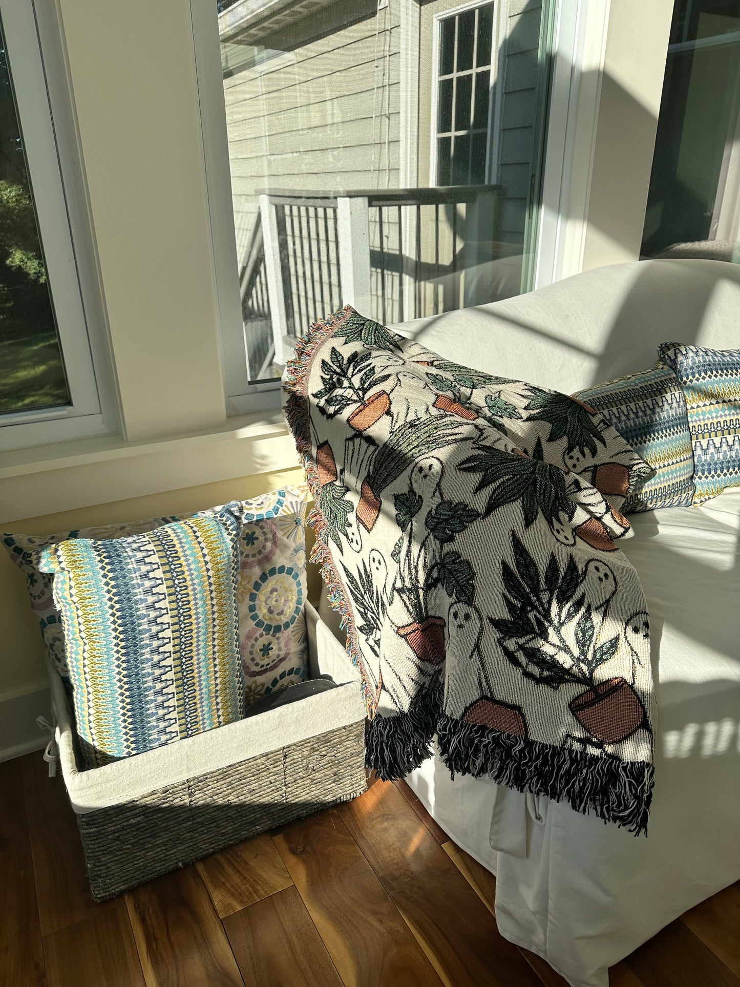 ghost woven blanket 50x60” clearance with potted plants