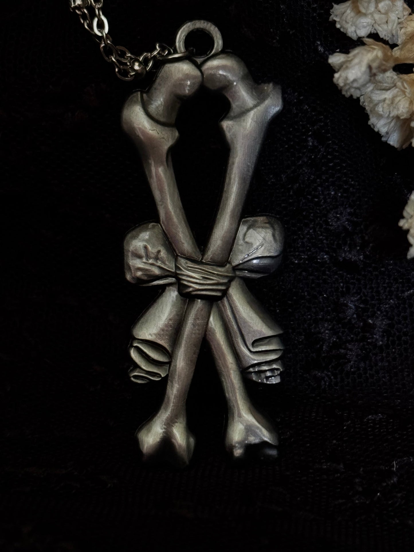 Carved In Stone- Bow and Bones – Adornments