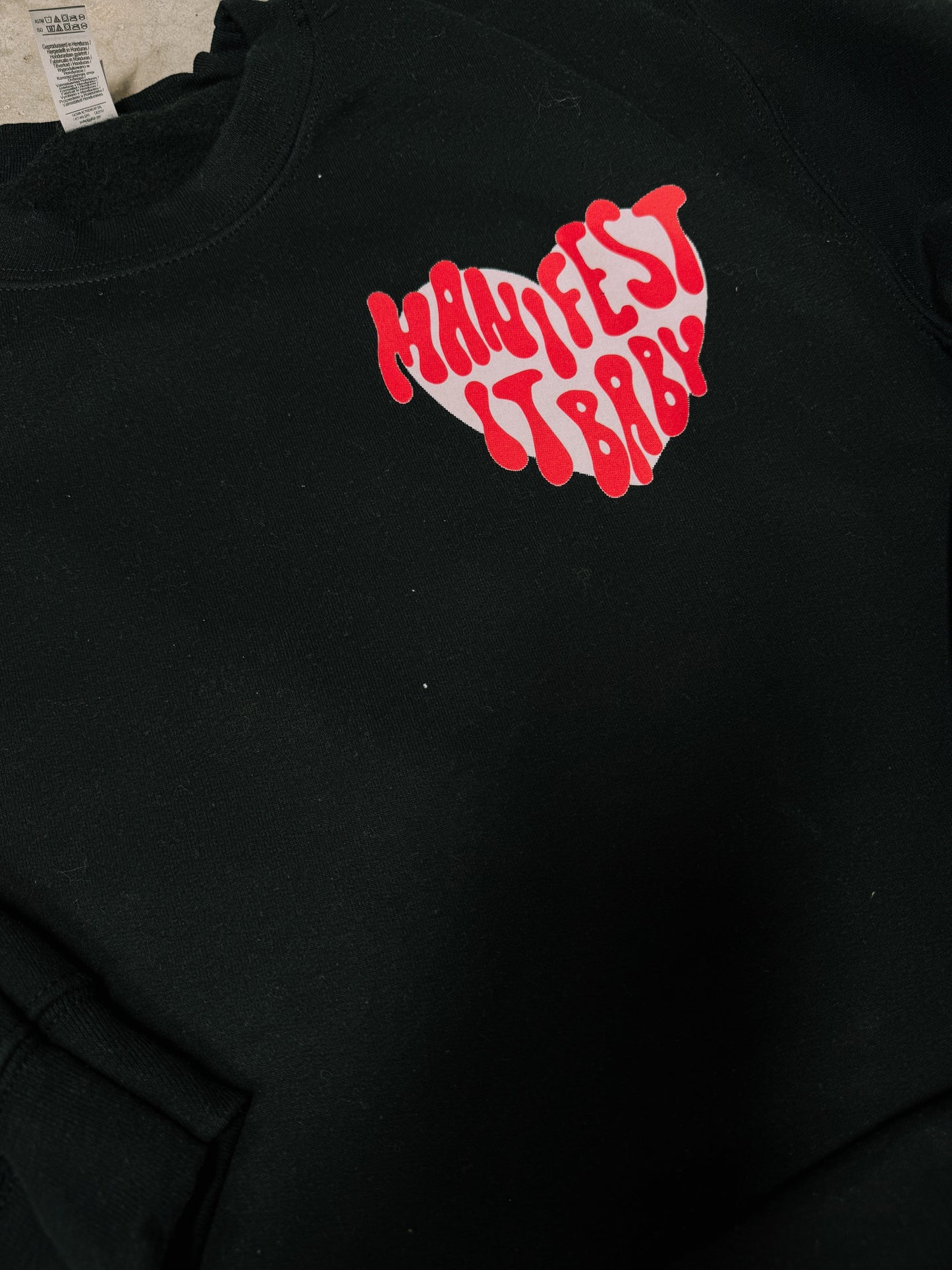 Manifest It, Baby – Black Hanes Crewneck (Front & Back Print)