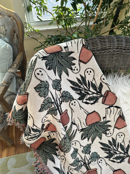 ghost woven blanket 50x60” clearance with potted plants