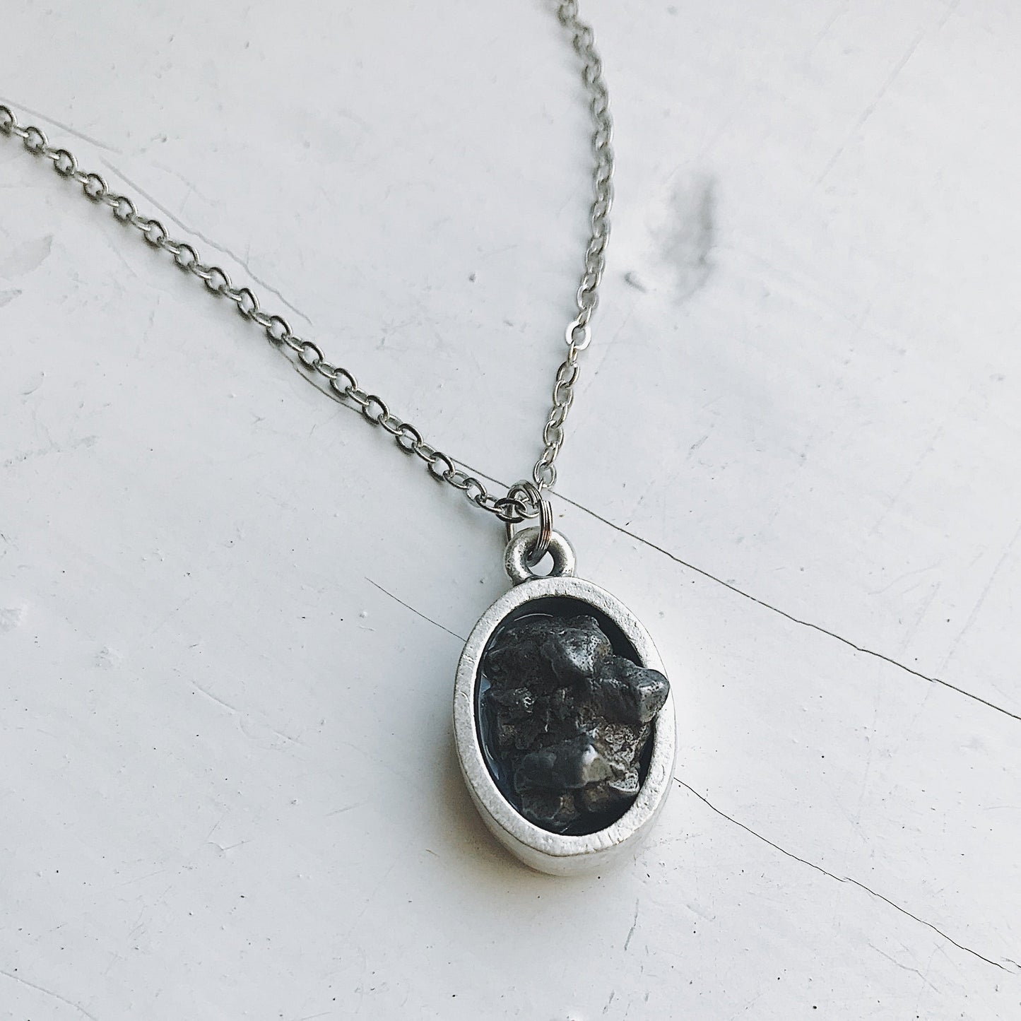 Oval Raw Meteorite Pendant Necklace in Matte Brushed Silver – Necklace