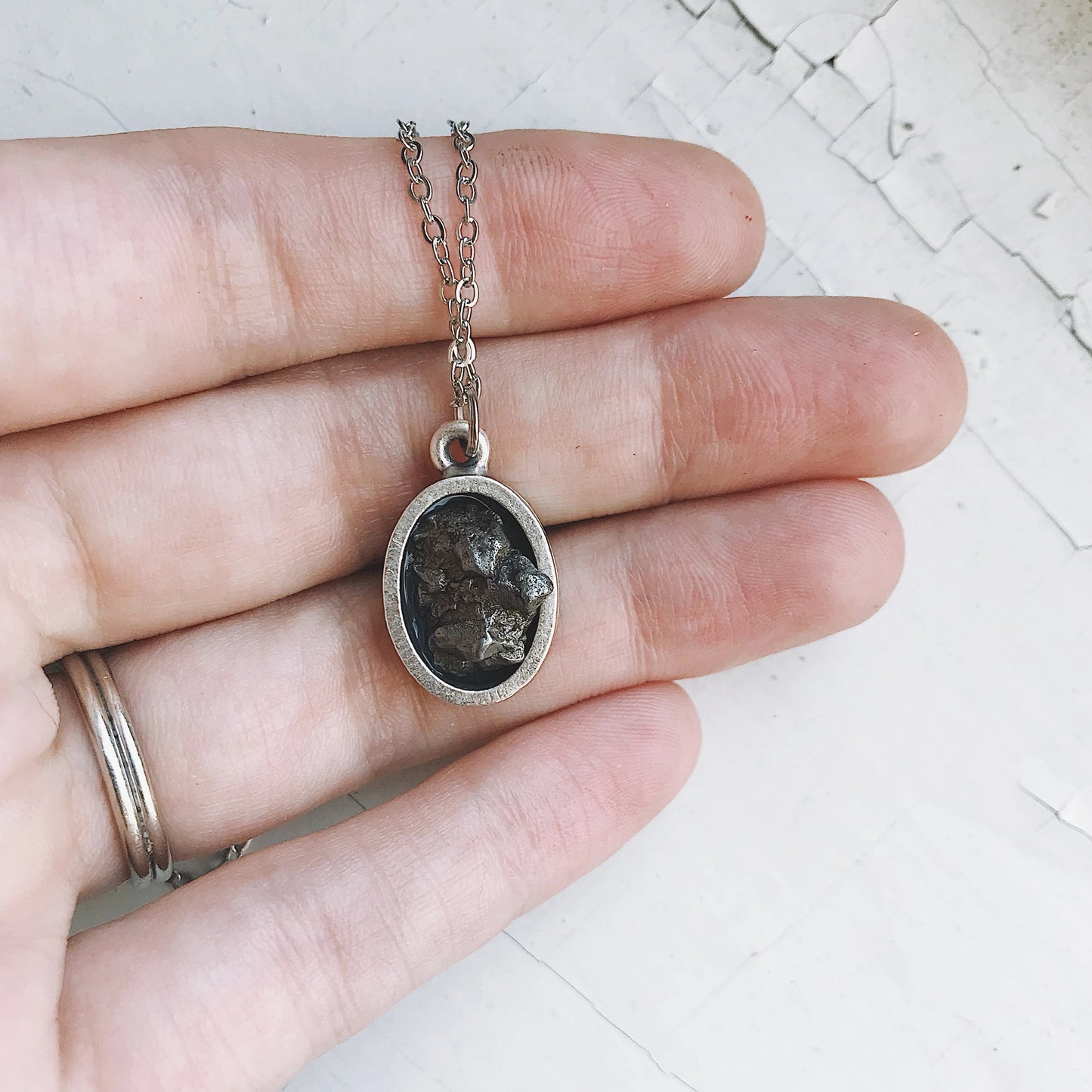 Oval Raw Meteorite Pendant Necklace in Matte Brushed Silver – Necklace