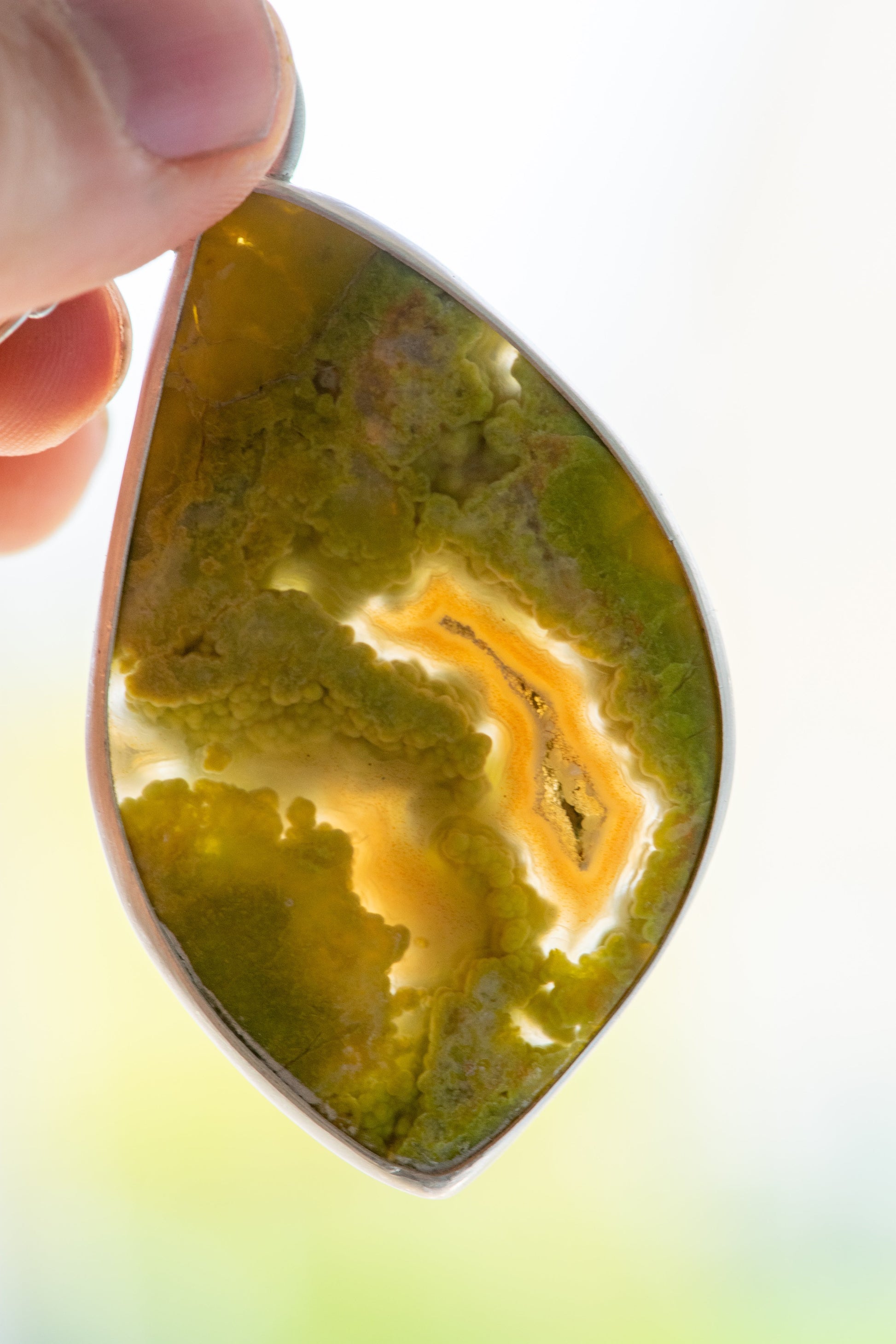 SINGING SISTERS GREEN OPAL NECKLACES –