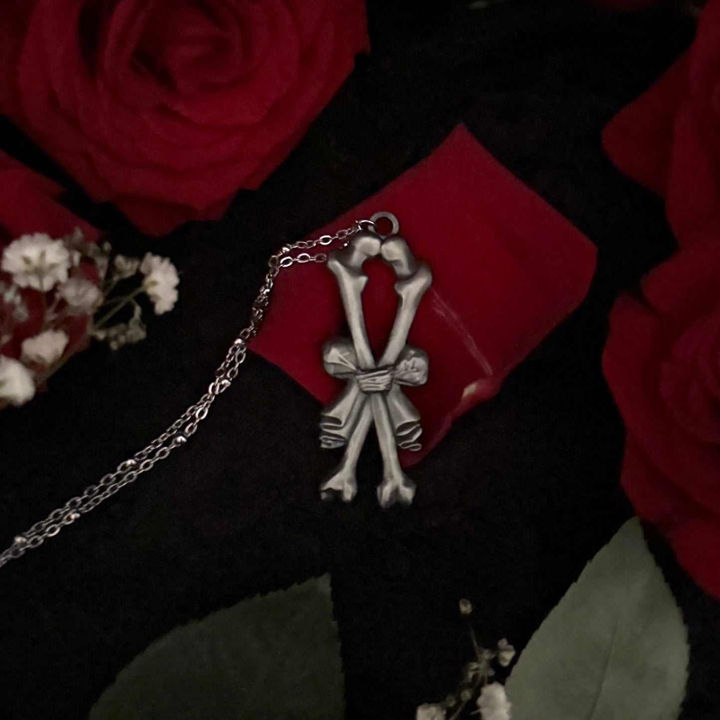 Carved In Stone- Bow and Bones – Adornments