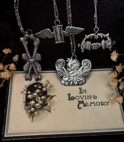 Carved In Stone- Skull and Plumes – Adornments