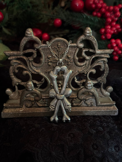 Carved In Stone- Bow and Bones – Adornments