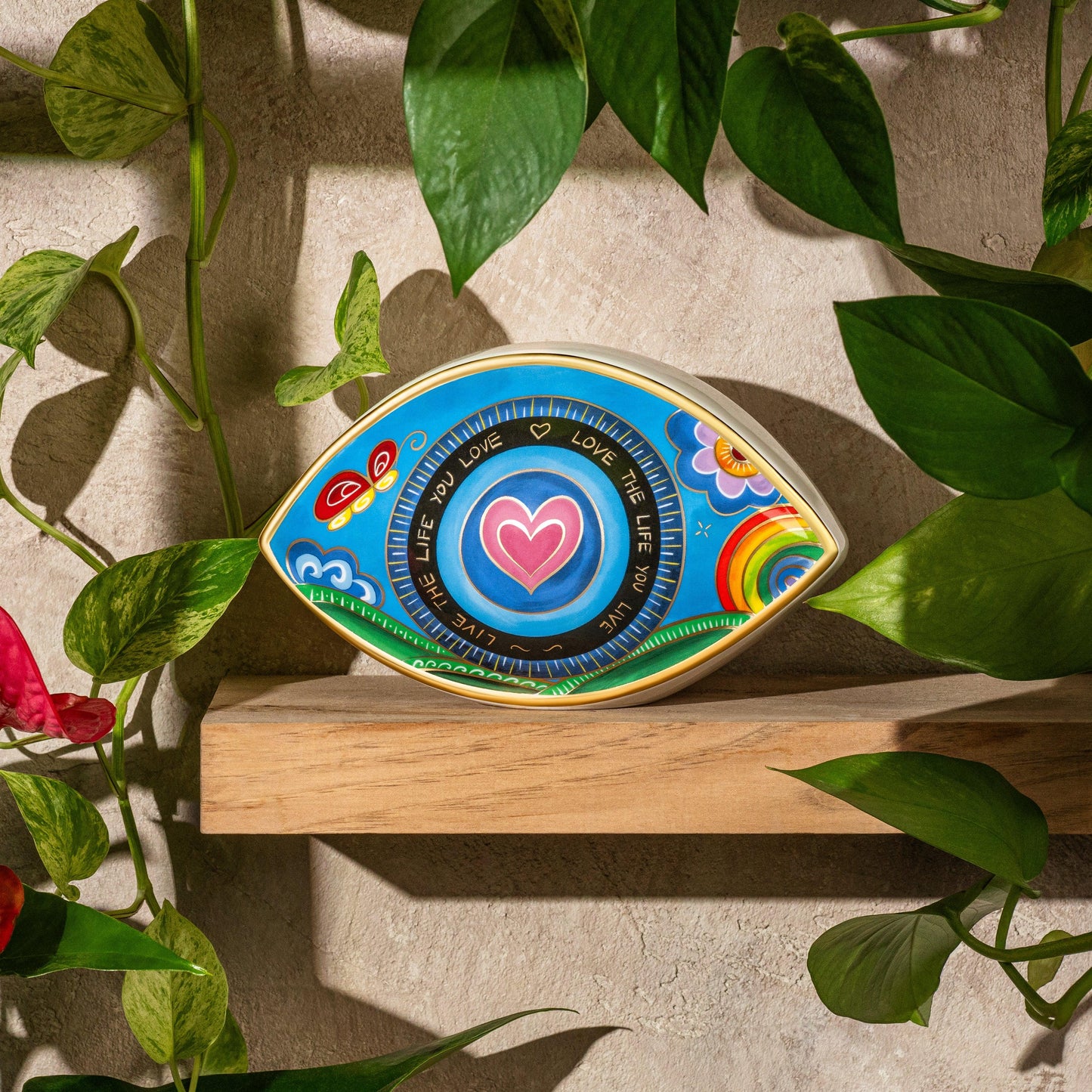 Radiant Bliss Ceramic Evil Eye Statue – Home Decor