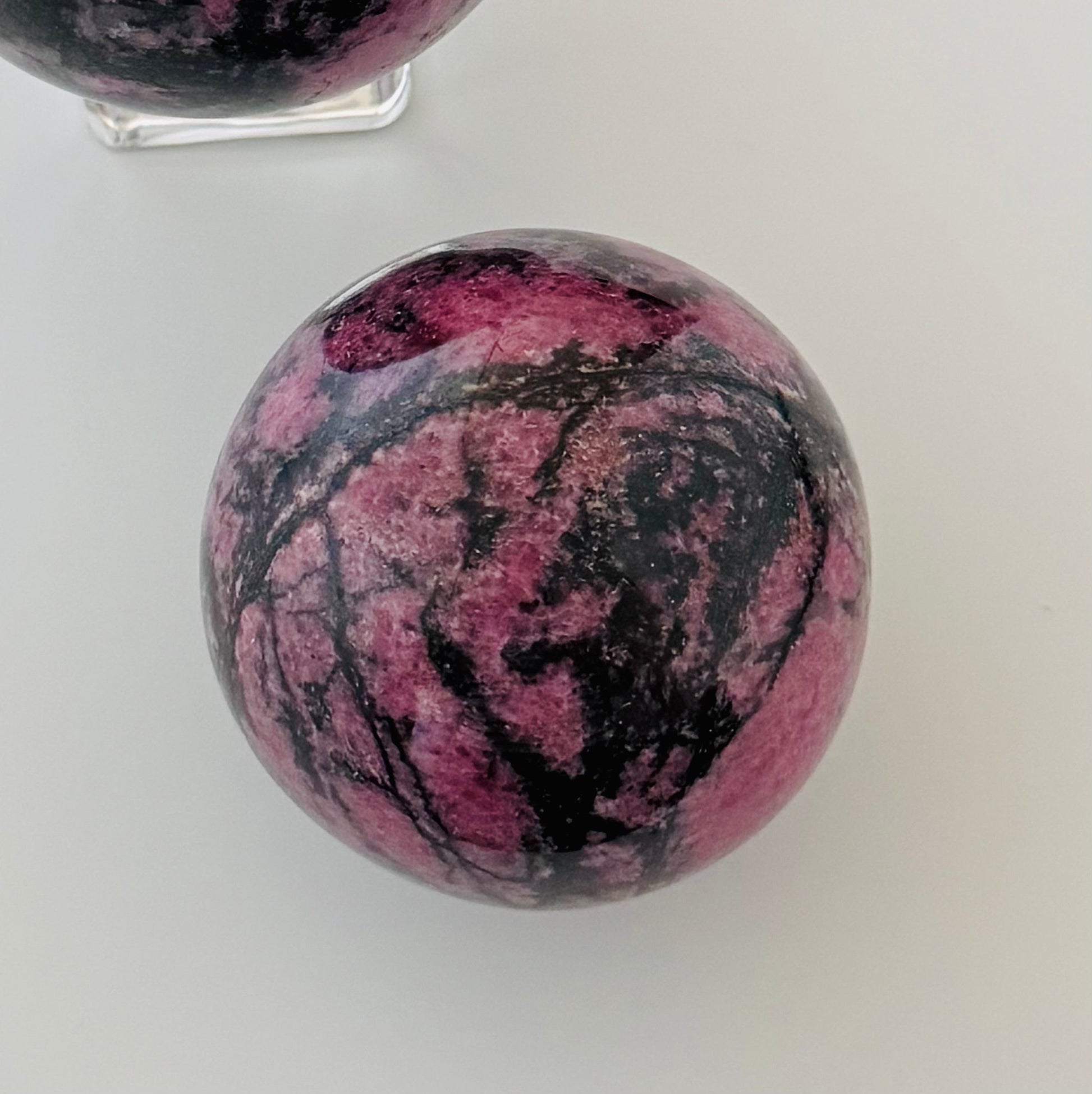 Rhodonite Sphere – 69 mm