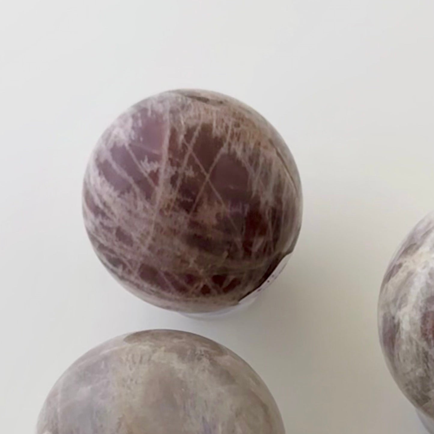 Sunstone in Moonstone Sphere – 56 mm (more Sunstone)