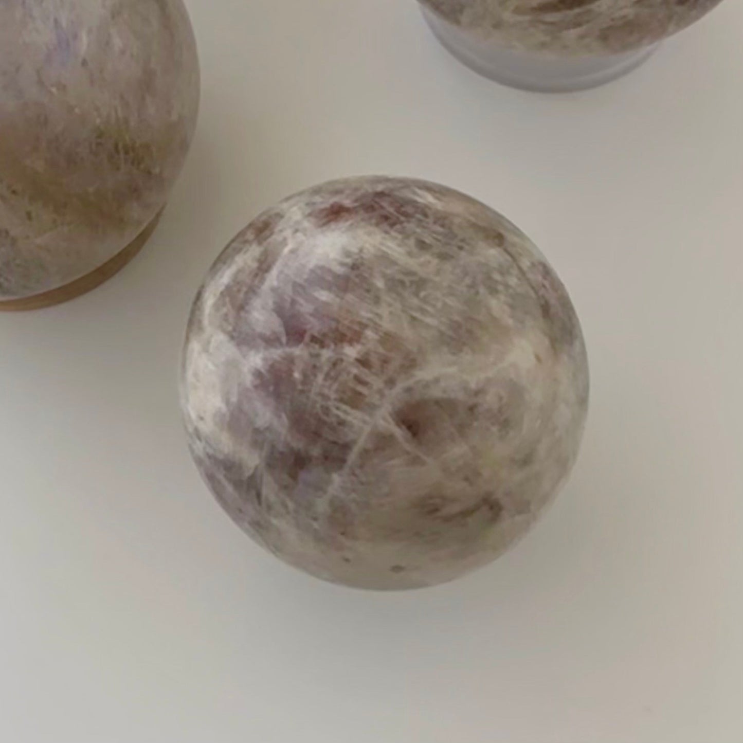 Sunstone in Moonstone Sphere – 56 mm