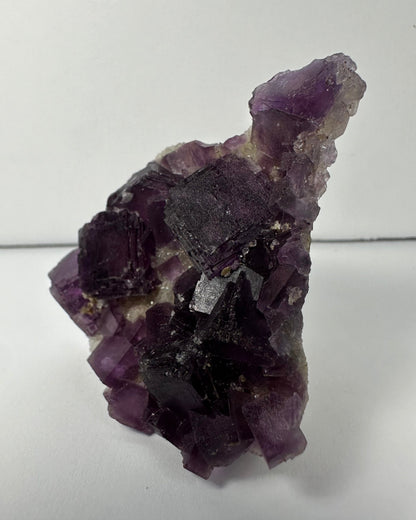 Purple Cubic Fluorite on matrix