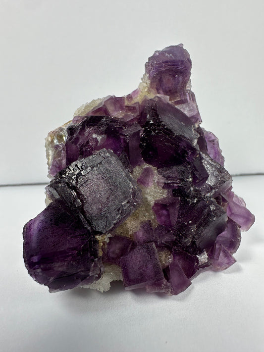 Purple Cubic Fluorite on matrix