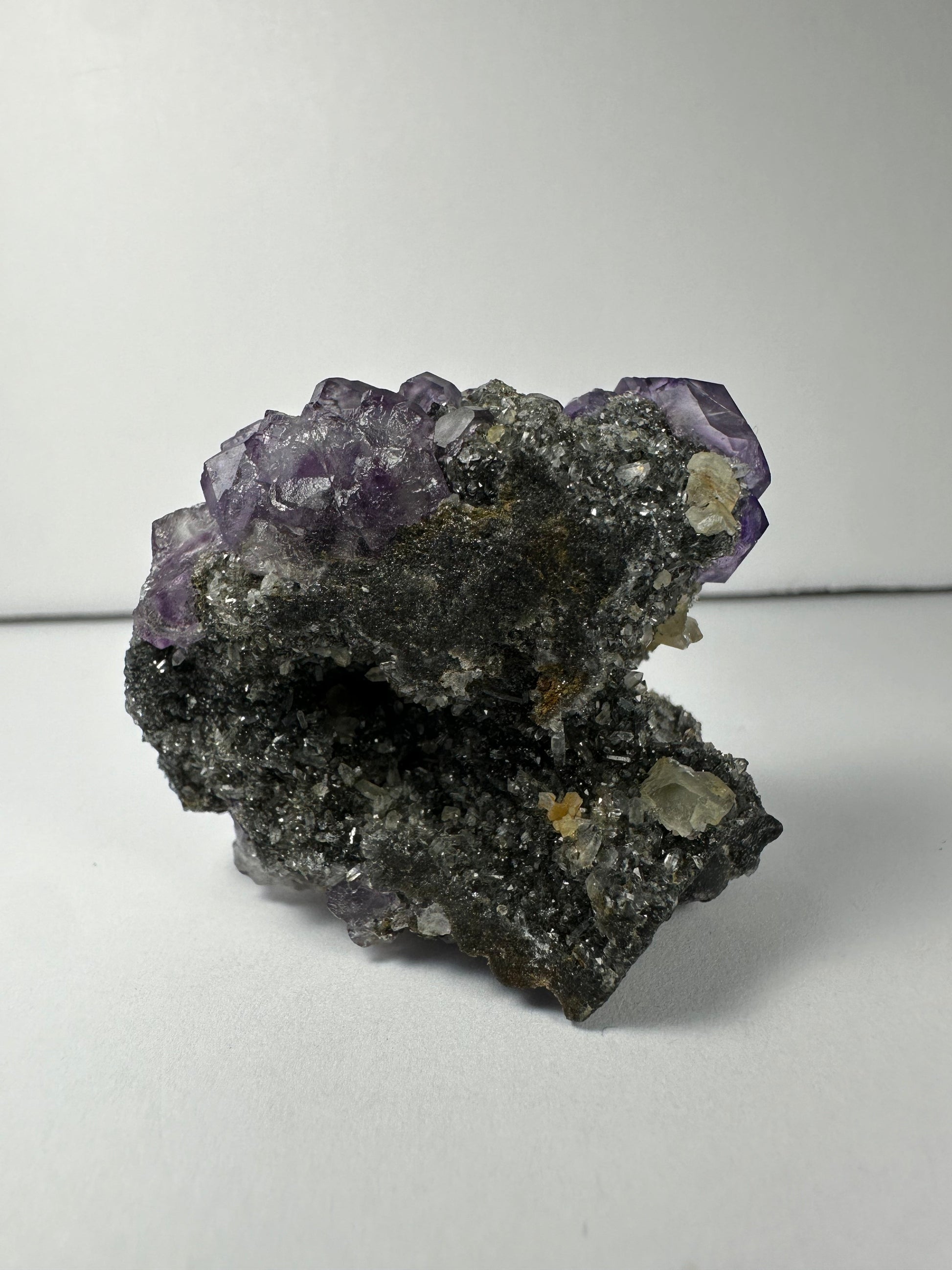 Purple Dodecahedral Fluorite with Calcite on matrix – Minerals