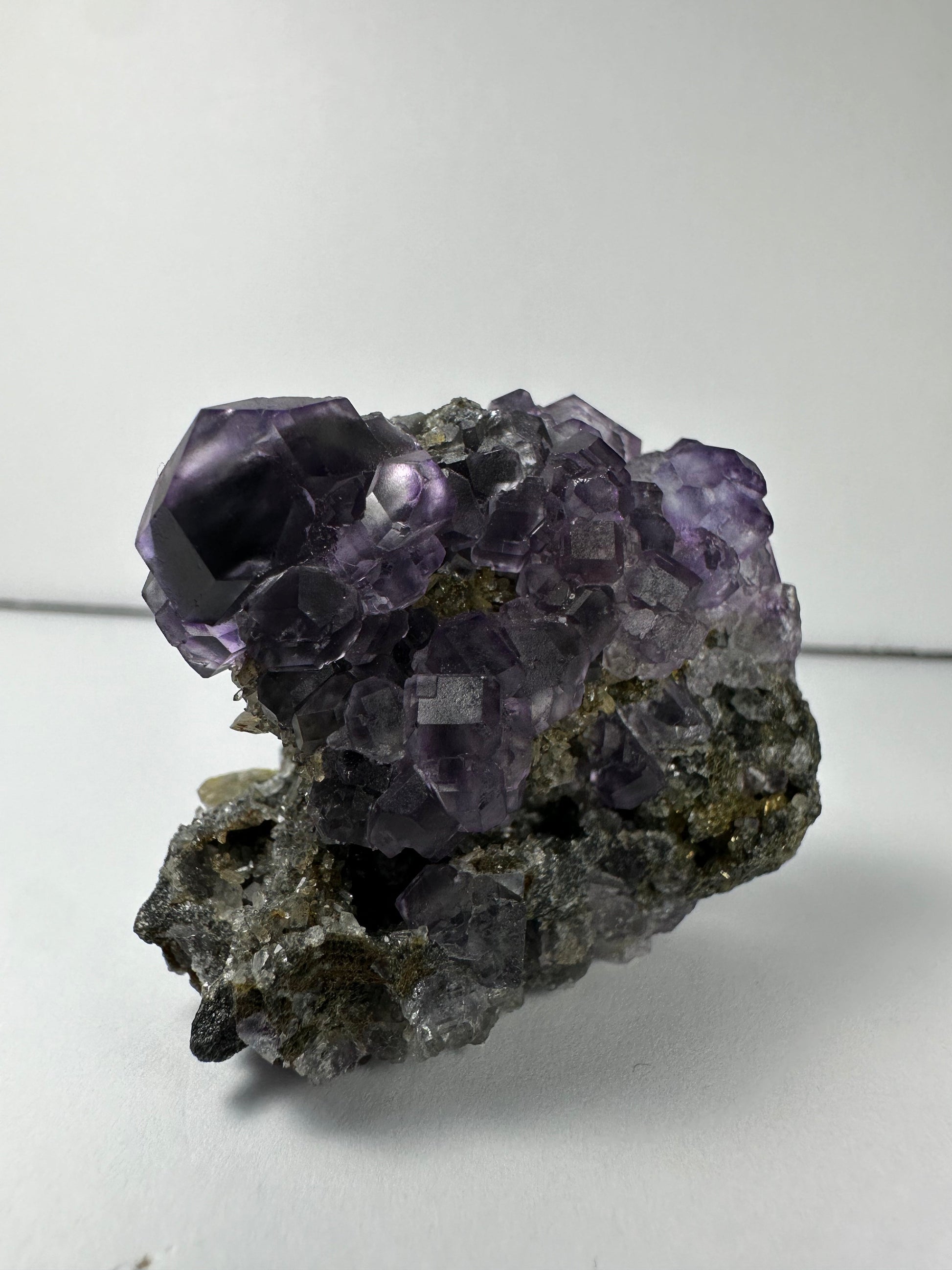 Purple Dodecahedral Fluorite with Calcite on matrix – Minerals