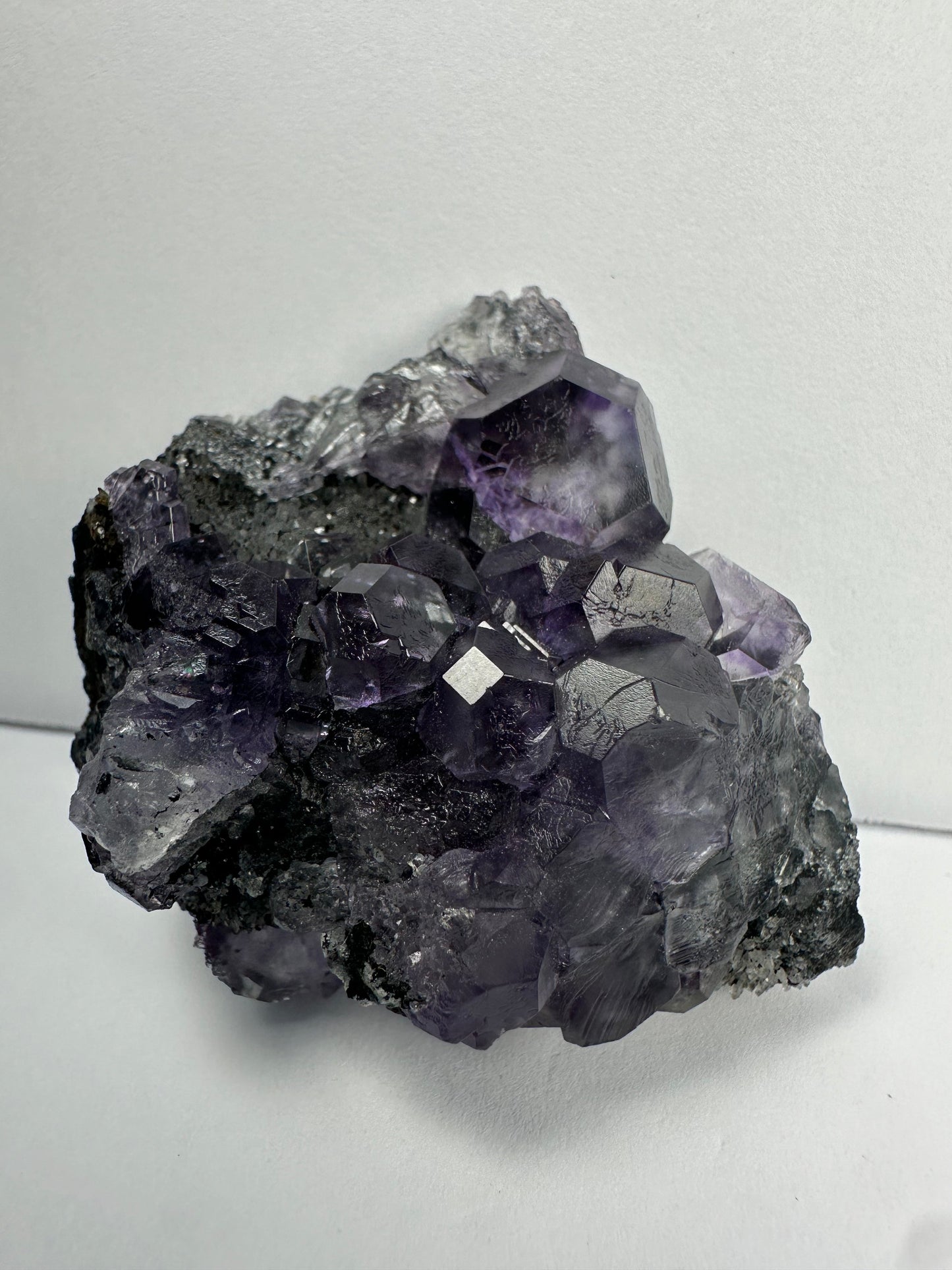 Purple Dodecahedral Fluorite with Calcite on matrix