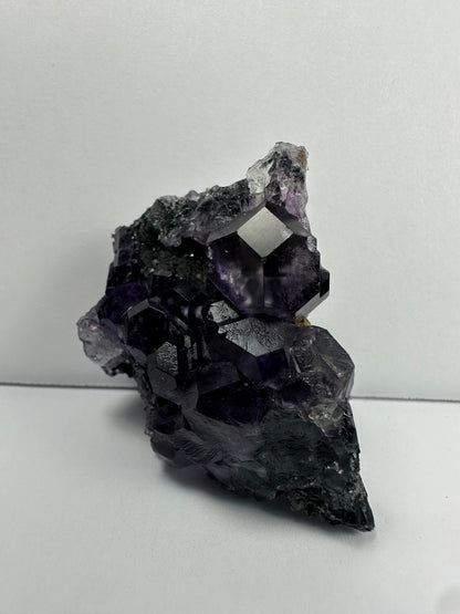 Purple Dodecahedral Fluorite with Calcite on matrix
