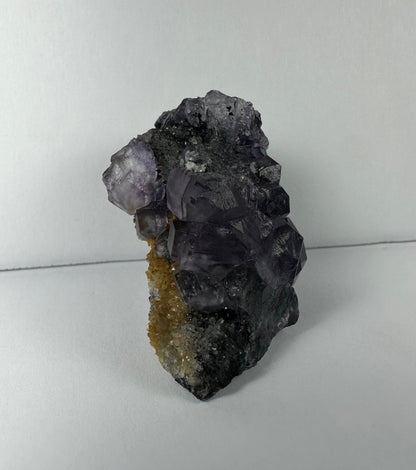 Purple Dodecahedral Fluorite with Calcite on matrix