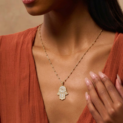 Inspired Action Gold Evil Eye & Hamsa Hand Necklace