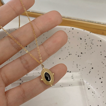 Serpent Coin Necklace – Black Oval Necklaces