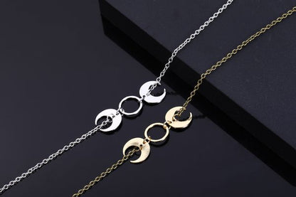 CRESCENT NECKLACE –