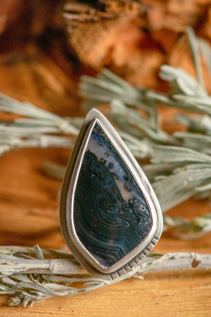 PSILOMELANE STRIKE RING