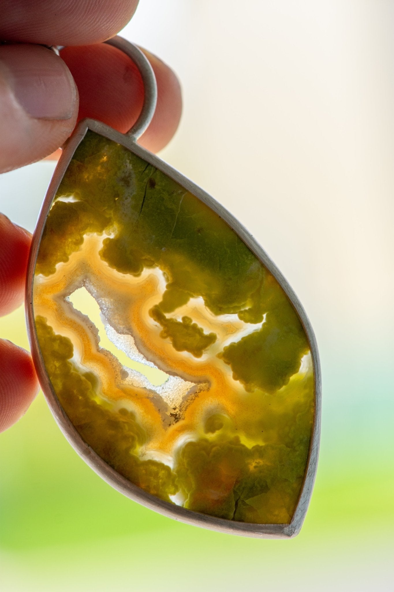 SINGING SISTERS GREEN OPAL NECKLACES –