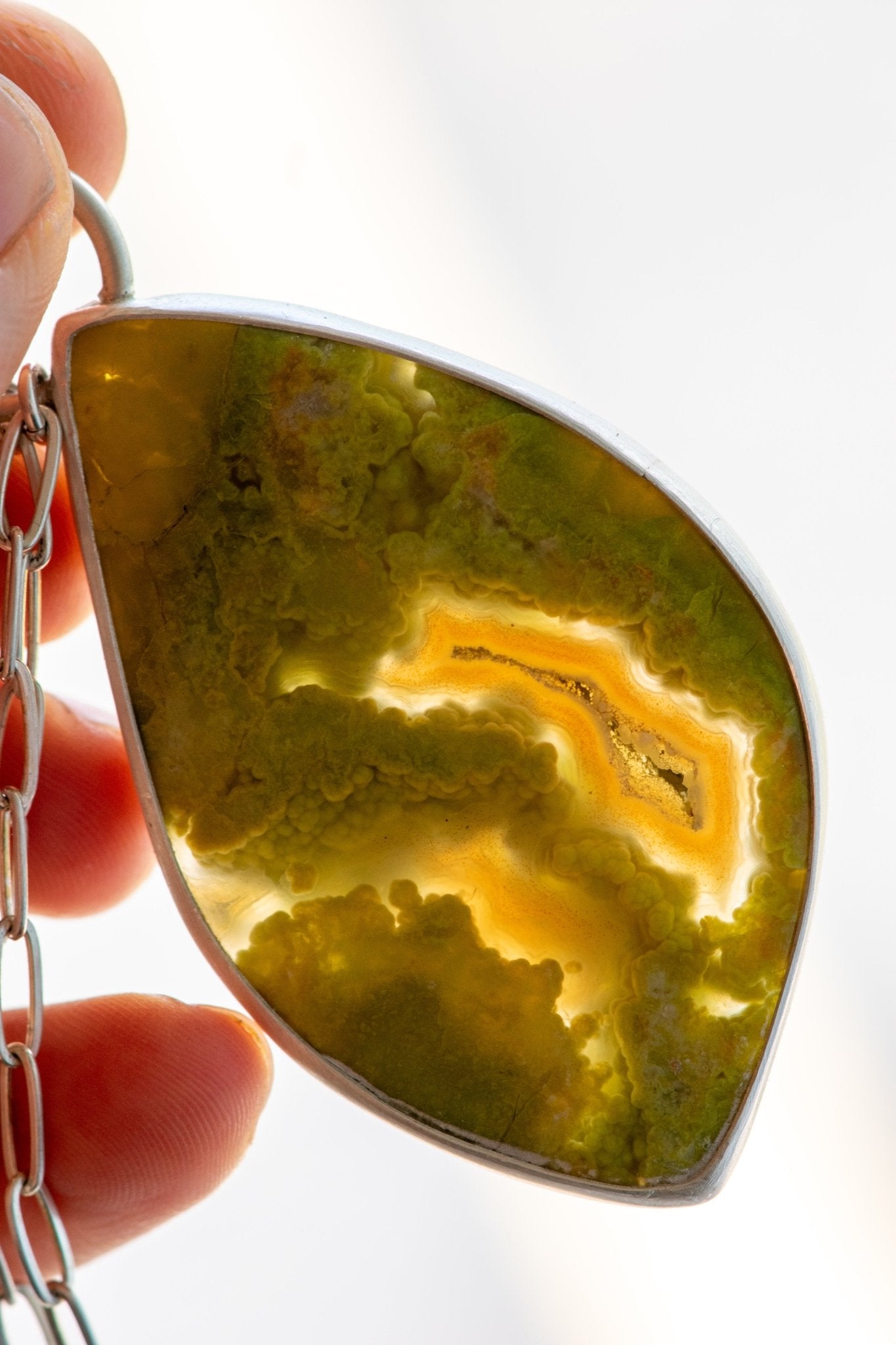 SINGING SISTERS GREEN OPAL NECKLACES –