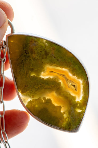 SINGING SISTERS GREEN OPAL NECKLACES –